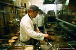 just a guy cooking at the Takashimaya department store food court
