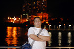 
Big Cat in front of the Beautiful Night Scenery