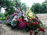 May u rest in peace, even the flowers covered u up....