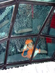 #12<BR>Removing snow/ ice on the surface of igloo......