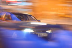 luxury sedan in motion