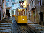 Centuries old tram chugs along the cobbled Lisbon streets. Elevador de Bica