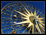 
this is not JUST a ferris wheel, but it consists of swinging & sliding gondolas... WICKED COOL!!!