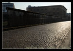 remaining of the berlin wall at sunset