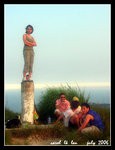 joyce posing on top of the peak with our dedicated crew at the background