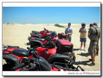 Riding Quad Bike on sand dune for 2 hours. Sun-burnt and dusty, but great fun!!