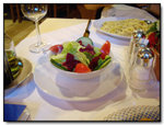 The salad comes with the calamari, no sauce