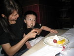 C enjoying B cake