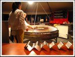 
Big grill for the Bratwurst (BBQ sausages) at a food stall.