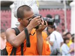 
Cameraman take shots for the Buddha !?