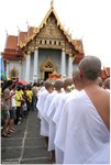 Monks line-up in front of Chinnarat Buddha in Wat Benchamabophit