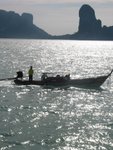 speedboat across the sunset