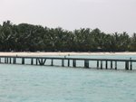 The wooden bridge from the pier to the beach