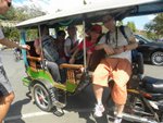 Can't imagine that the capacity of tuk tuk could be 8...