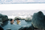 public hotspring along a swan lake