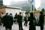 people cannot smoke on the street in many areas in Tokyo.  they can only smoke at smoking areas like this.