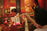 Lighting jossticks - Kuan Yin Teng