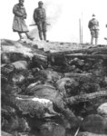 長江邊上成千上萬的被日軍燒焦的屍體 
Some of the thousands of corpses burned by the Japanese Imperial 
Army by
the bank of the Yangtze River.