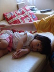 She loves to play "pretend sleeping"