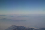 飛機離開香格里拉飛往云南,途中可看到雪山峰