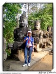 tone figures guard the entrance to Angkor Thom