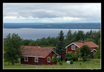 red wooden houses in dalarna region