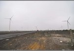 the biggest wind power station area in Xinjiang is located just beside the highway