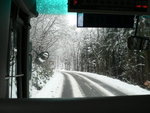 20071224 the slow bus was climbing to the snow mountain