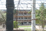 S-21是柬埔寨首都金邊的一所集中營，於1975年至1979年間曾被柬埔寨共產黨(紅色高棉)政權用作屠殺。在當地，該集中營又被稱為"堆屍陵"(Tuol Sleng)，意即"有毒的高地"。