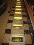 Crown's (Casino) lobby - 
Real gold bar hallway.  How heavy per bar?