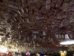 A millions bar with dollar bills all over the places.