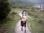 經過兩個多鐘既行程 , 重要間中抱下隻狗 , 呢個面口已經算唔錯架喇