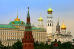 The tall white tower is 'Ivan the Great Bell Tower' inside Kremlin. The Water Tower is in the foreground, with the Great Kremlin Palace (green roof) behind.