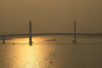 Sai Van Bridge 西灣大橋. It's too hazy, only a back-lighted photo can reveal the outline of the buildings.