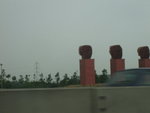 art pieces along the street. oops... i can't capture it clearly, the car is too fast