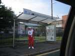 bus stop in glascow. hey guy, i wanna take photo, can u plz stand aside?