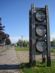 A direction sign to town