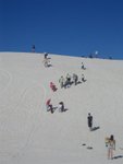 Hurry, go up to the top! Sand boarding!