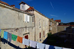 This is how the local (and us while living there) dried the laundry (These were dangling off a rope at 2 storeys high)