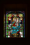 A stained glass window inside the Church