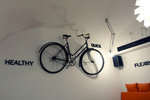 On one wall is a bike, pretty chic design
