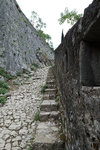 Walking up along the city wall. You could choose the steps or the other slippery path