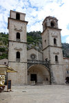 St. Triphon Cathedral, built in 1166. When the frontage was destroyed in 1667, the bell towers were added but the left one was never finished.