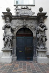 Another side-door of the Cathedral, it reads virtue and merits
