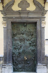 This bronze door was made to commemorate Pope John Paul II's visit to Slovenia in 1996. The Pope could be seen at the top