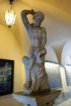 Just inside the entrance is a 17th-century statue of Hercules wielding a club and preparing to batter a wild beast.