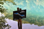 After much descending we arrived at the lakes' level. The first one is Kaluderovac. They have got signpost for each of the lake, stating the facts and its relative position. This one is right at the lowest point