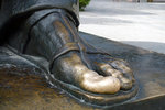 People rub his toe for good luck as you can see it is well polished