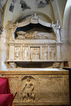 The altar with the sarcophagus of St. Domnuis consists of three slender octagonal pillars which carry a canopy, under which the sarcophagus with the figure of the bishop lying.
