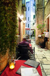 Dinner time - tables are lit up everywhere, the atmosphere of the old city is very different after dark